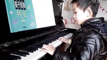 七岁男孩钢琴弹奏星月神话